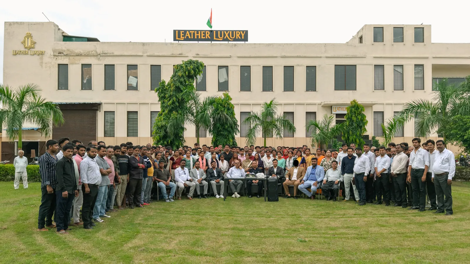 The entire LEATHER LUXURY team gathered in front of the Agra factory